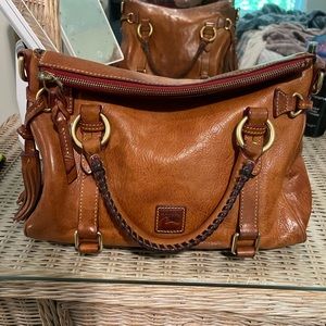 Dooney and Bourke small florentine satchel in natural. Bag has BEAUTIFUL patina.